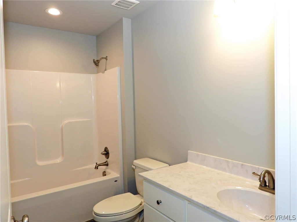 4608 Pin Oak Road Prospect, VA 23960 - Photo 20 of 29 a bathroom with a sink toilet and shower