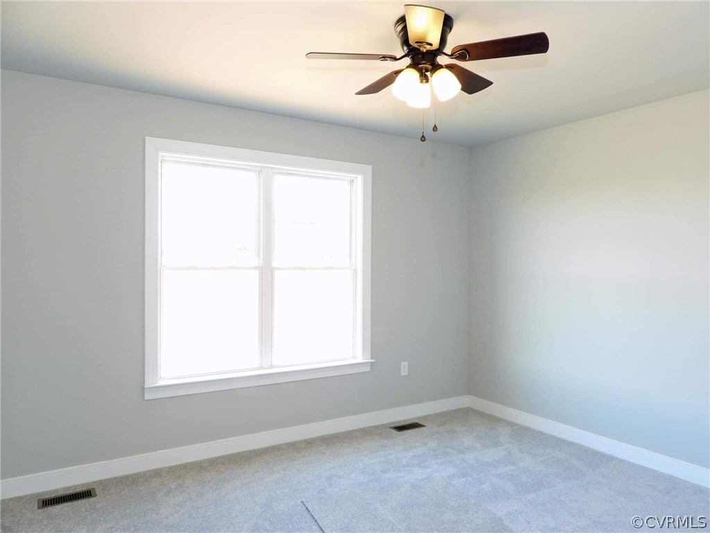 4608 Pin Oak Road Prospect, VA 23960 - Photo 28 of 29 an empty room with a window and a fan