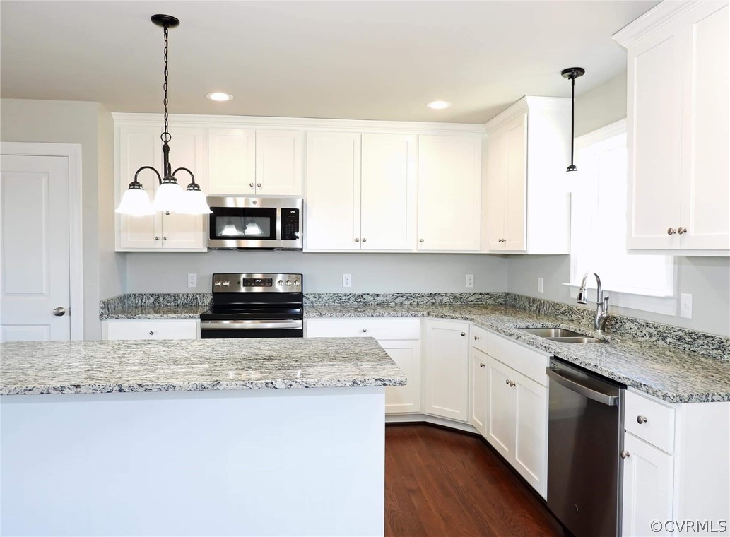 4608 Pin Oak Road Prospect, VA 23960 - Photo 5 of 29 a kitchen with stainless steel appliances granite countertop a sink a stove and a granite counter tops