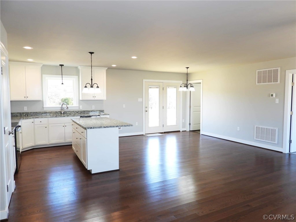 4608 Pin Oak Road Prospect, VA 23960 - Photo 8 of 29 a view of kitchen with granite countertop stove top oven and cabinets