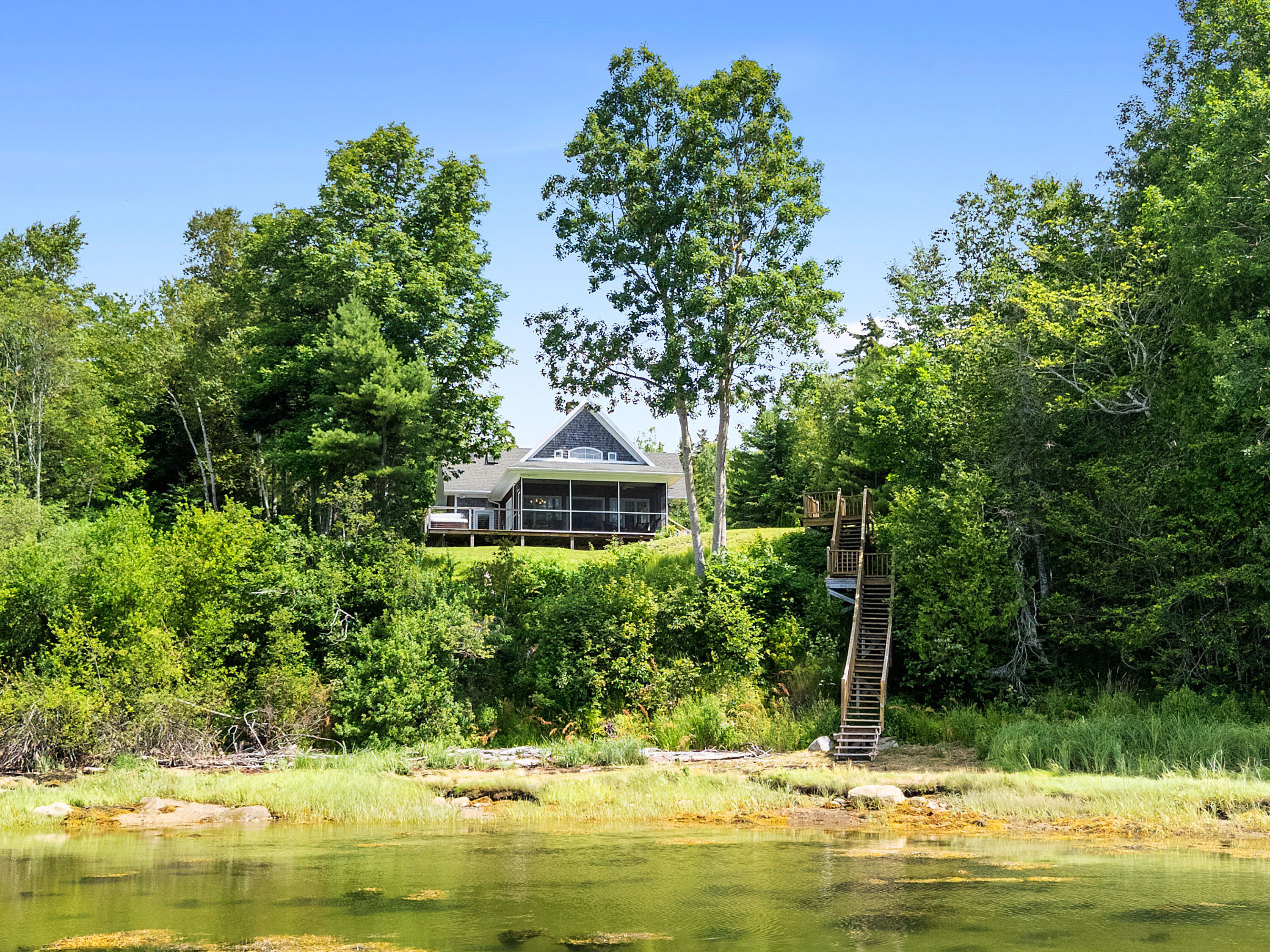 95 Osprey Reach Road Stockton Springs, ME 04981 - Photo 17 of 72 Home and stairs from water