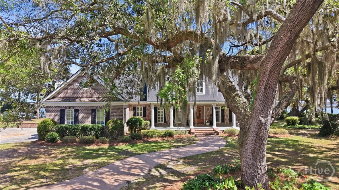 2024 Walthour Road Savannah, GA 31410 - Photo 29 of 46 Oak trees grace the circular drive.