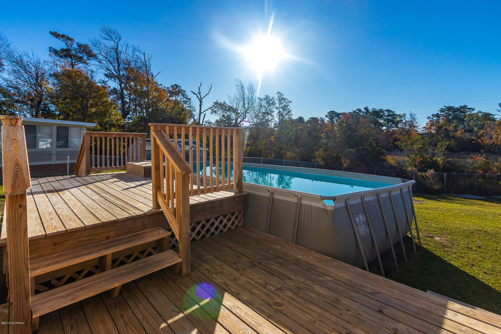3023 Old Gate Road Morehead City, NC 28557 - Photo 28 of 39 Back deck with swimming pool