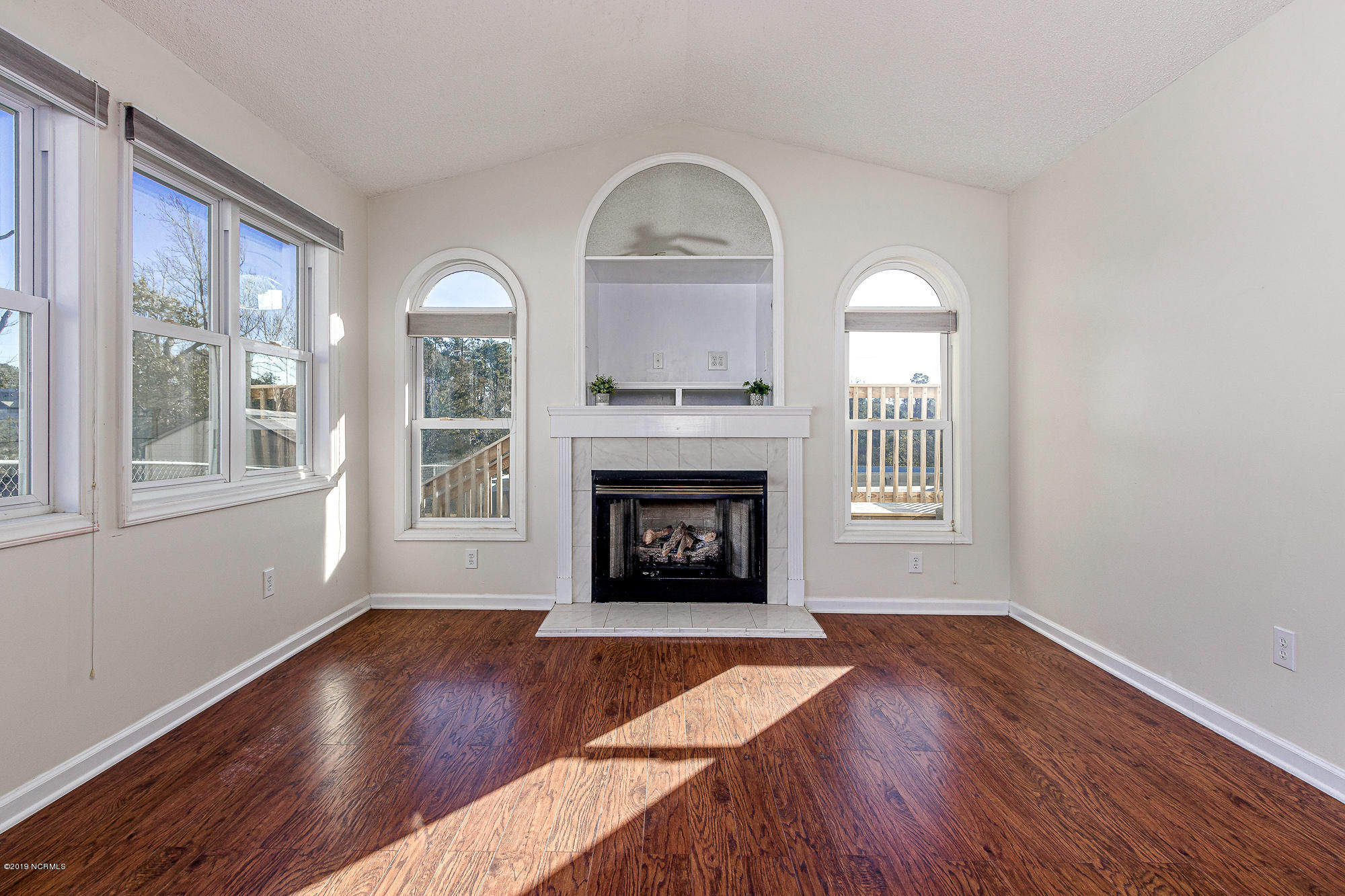 3023 Old Gate Road Morehead City, NC 28557 - Photo 6 of 39 Spacious den with fireplace