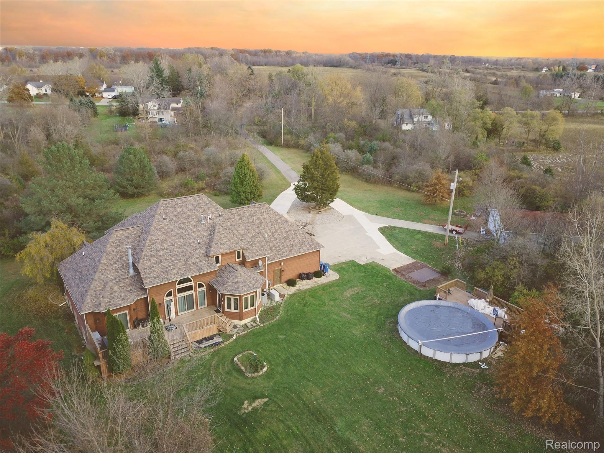 1225 North Morrish Road Flint, MI 48532 - Photo 4 of 27 Backyard with Pool and Pole Barn Morrish.JPG