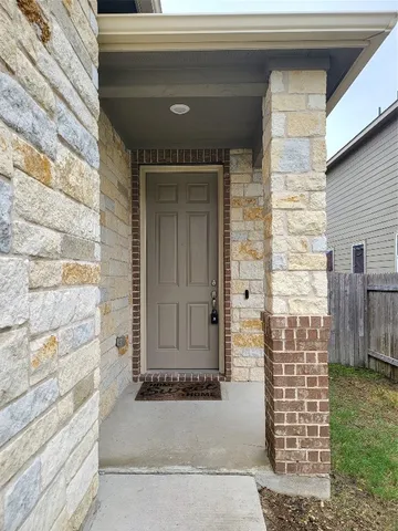 a front view of a house with a outdoor space