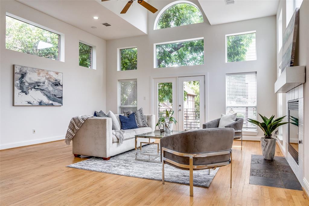 4919 Alcott Street Dallas, TX 75206 - Photo 1 of 1 a living room with furniture and a large window