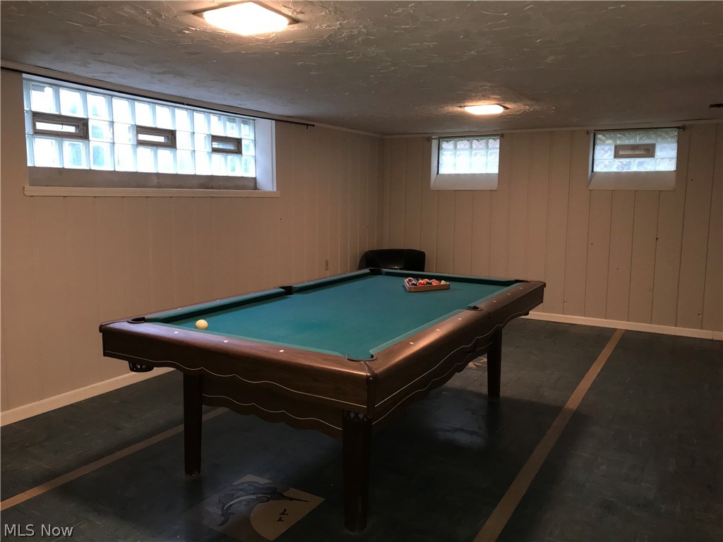 6564 Ridgewood Lakes Drive Parma, OH 44129 - Photo 28 of 33 Large rec toom with a pool table that can stay or go.
