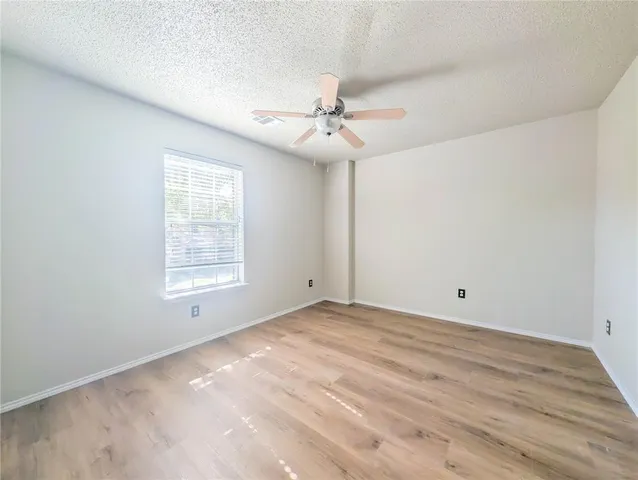 a bedroom with a workspace