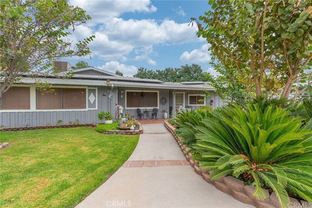 12787 Reche Canyon Road Colton, CA 92324 - Photo 1 of 1 a front view of house with yard and green space