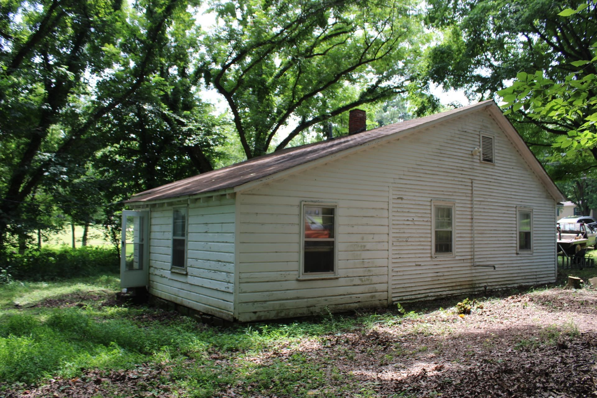 1364 Highway 59 Covington, TN 38019 - Photo 3 of 11 a backyard of a house with lots of green space