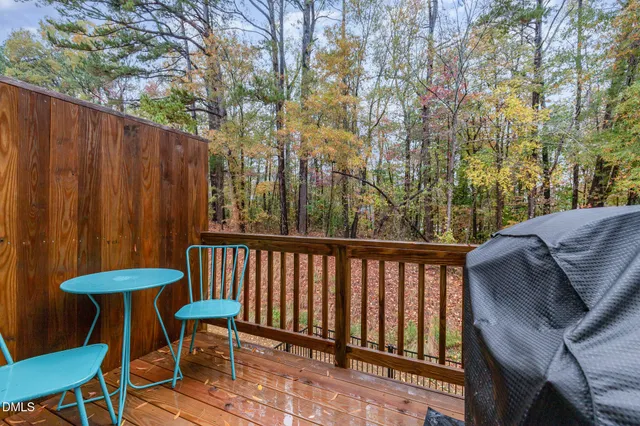 a bedroom with a bed and a desk