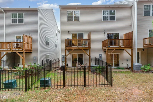 a bathroom with a sink mirror vanity and toilet