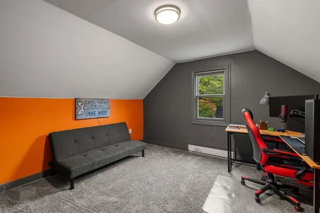 a view of a big yard with large trees