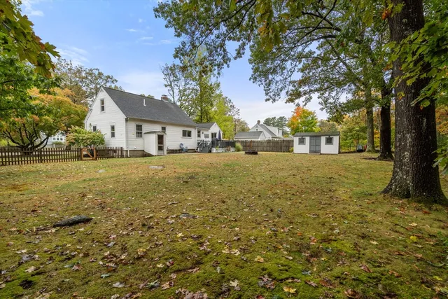 a view of swimming pool in a yard