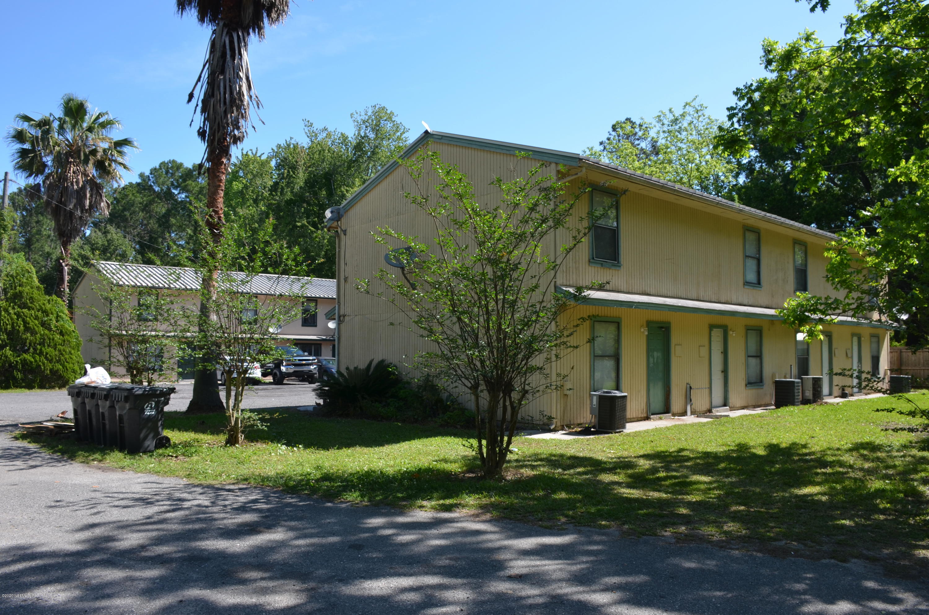 681 Rainer Road, Unit 3 Baldwin, FL 32234 - Photo 1 of 28 a view of a house with backyard and garden