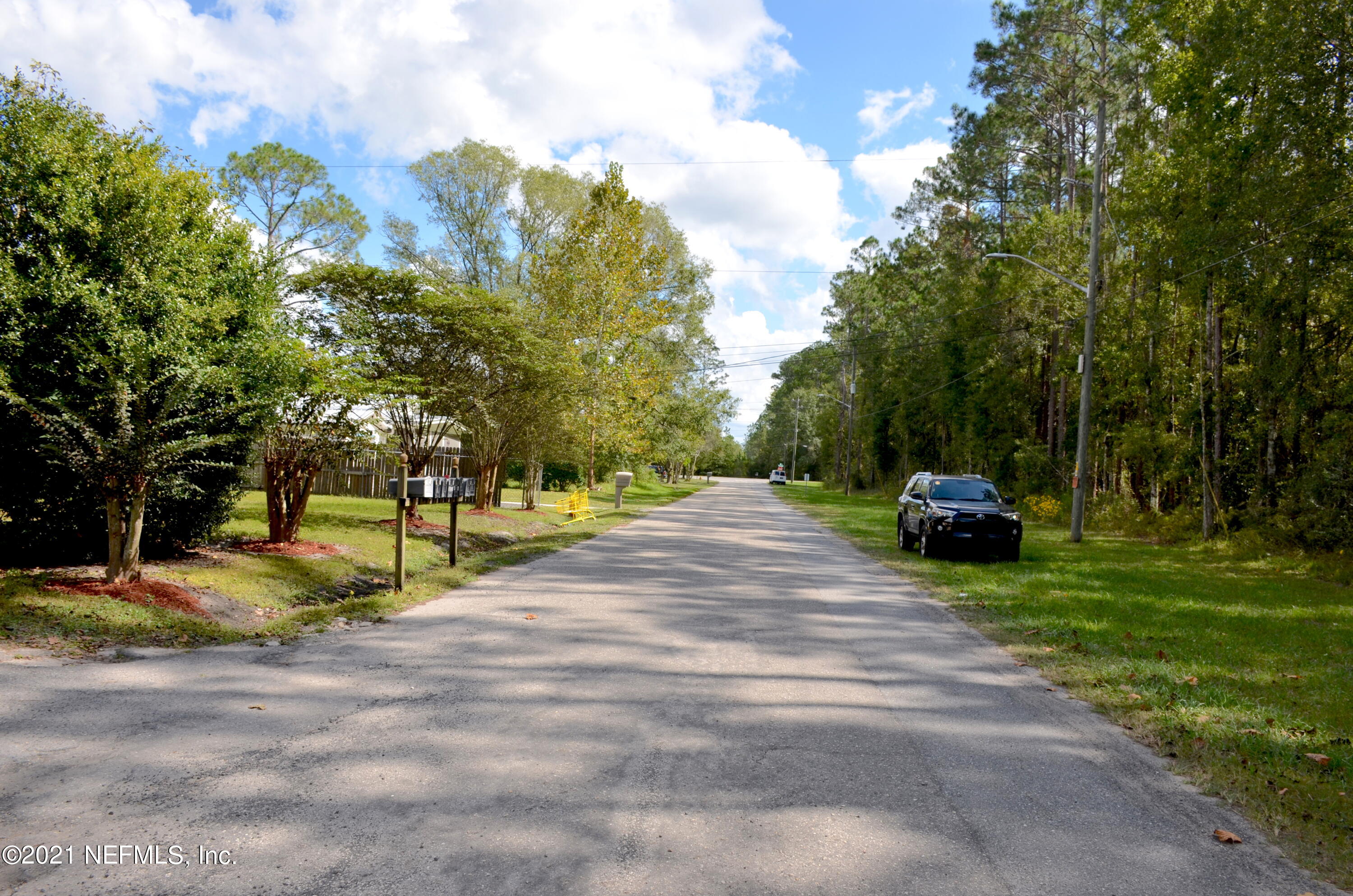 681 Rainer Road, Unit 3 Baldwin, FL 32234 - Photo 12 of 28 a view of backyard with swimming pool