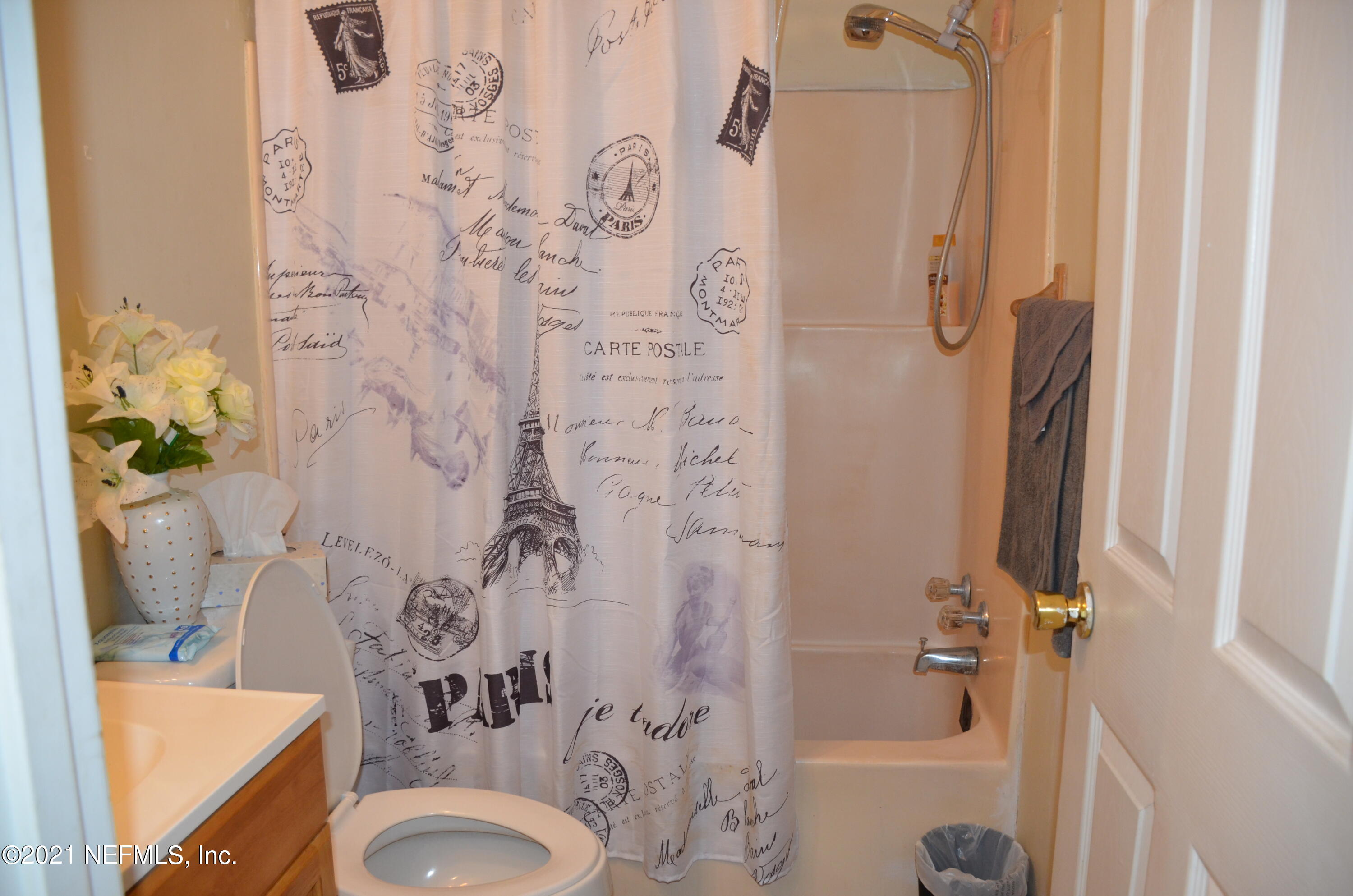 681 Rainer Road, Unit 3 Baldwin, FL 32234 - Photo 19 of 28 a bathroom with a sink toilet and shower