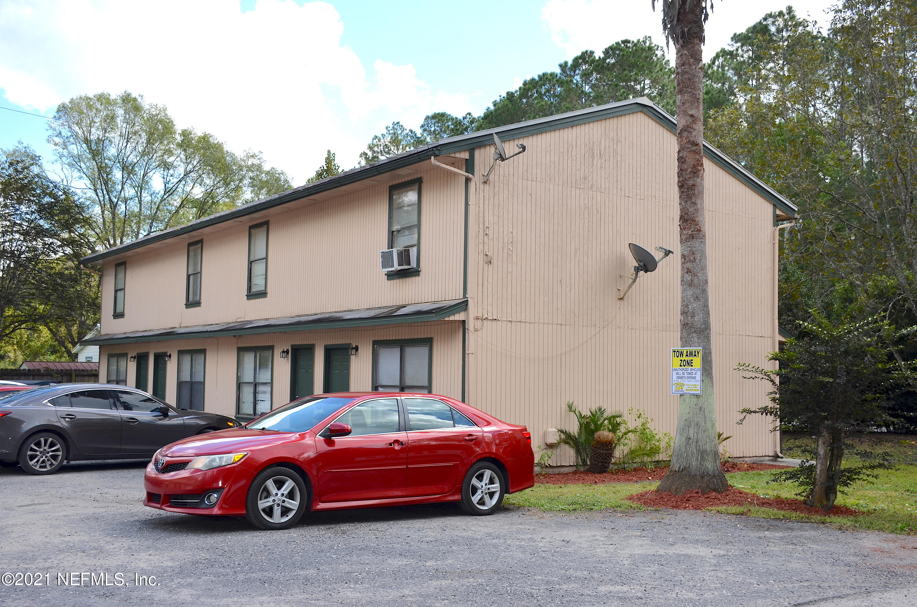 681 Rainer Road, Unit 3 Baldwin, FL 32234 - Photo 3 of 28 a car parked in front of a house