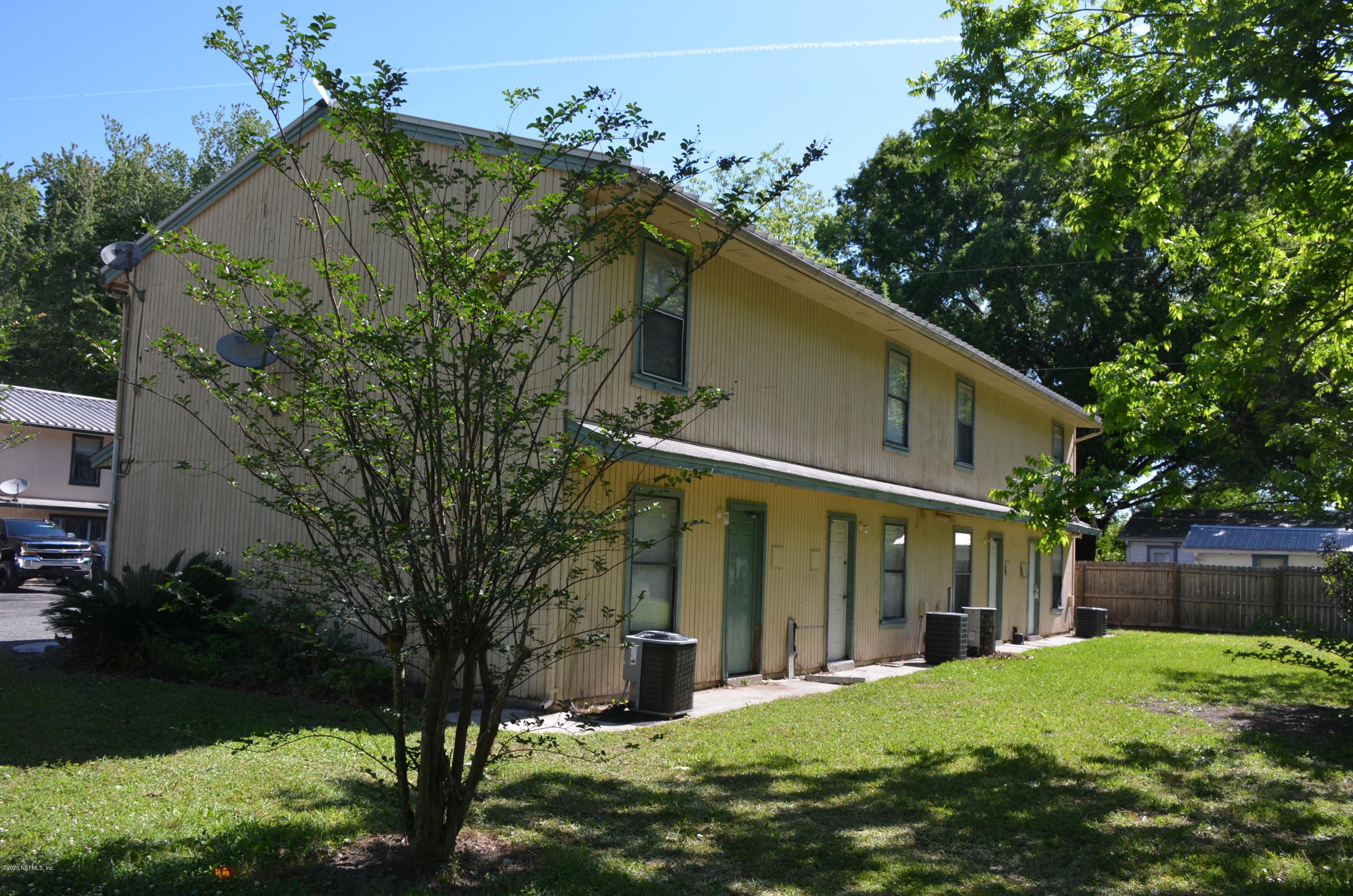 681 Rainer Road, Unit 3 Baldwin, FL 32234 - Photo 4 of 28 a view of a house with a yard