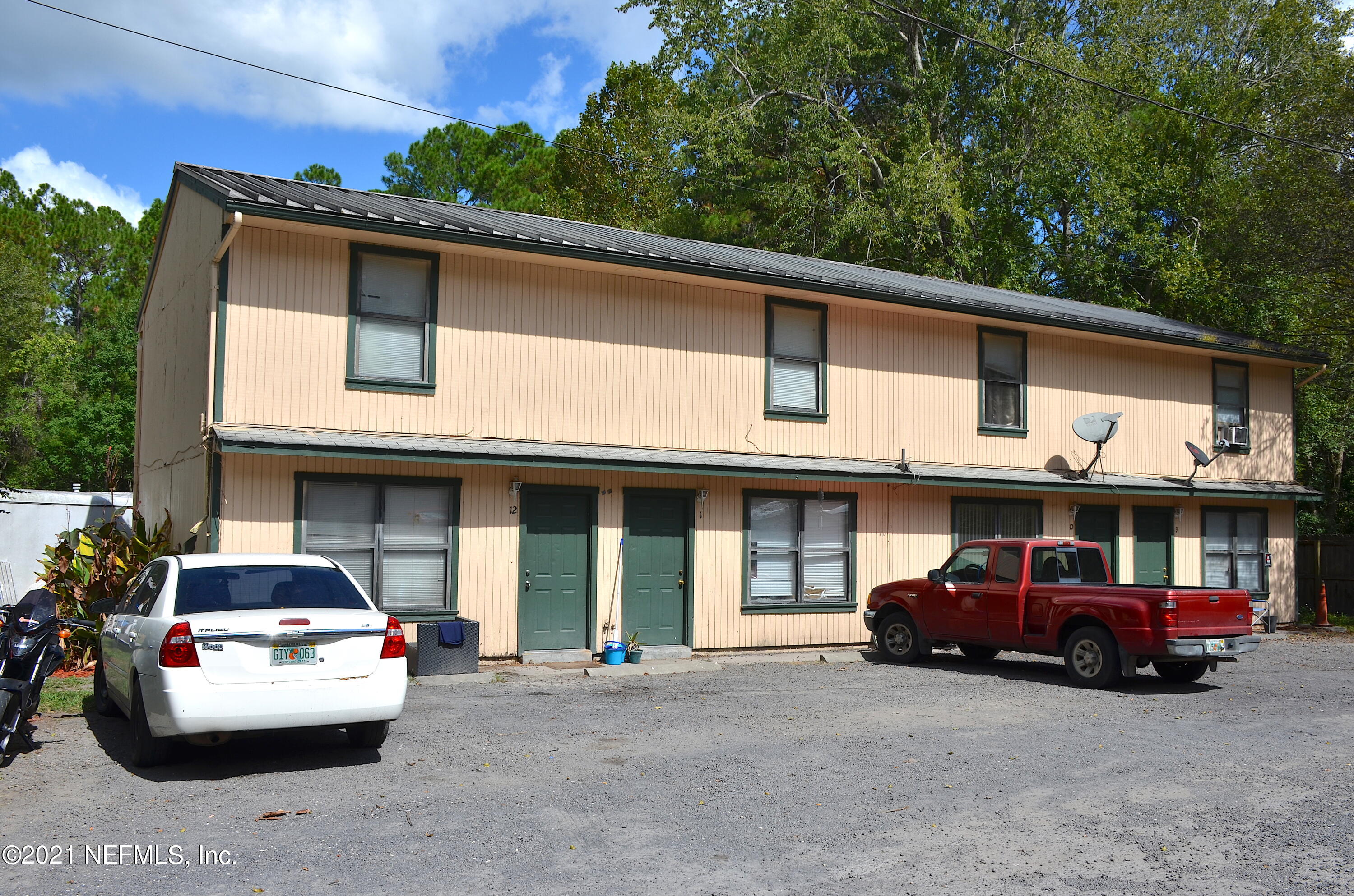 681 Rainer Road, Unit 3 Baldwin, FL 32234 - Photo 8 of 28 a car parked in front of a building