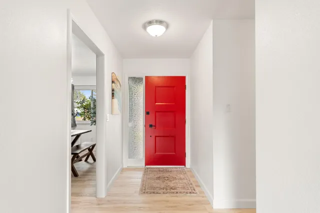 a view of a bathroom with a shower curtain