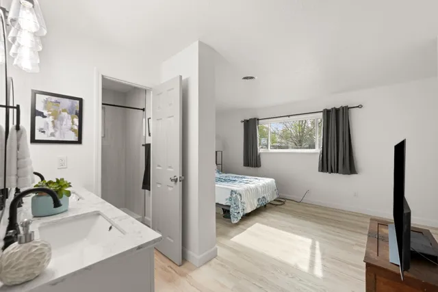 a bathroom with a sink and a mirror