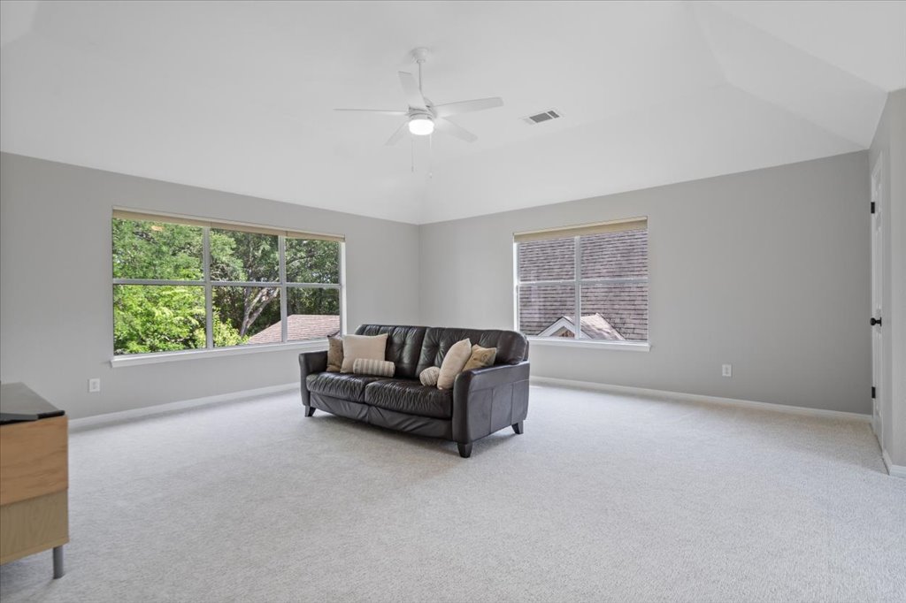 10801 Beachmont Lane Austin, TX 78739 - Photo 25 of 40 TONS of room in your upstairs game room - play area, media room, homework area, tons of options! Gorgeous view of the backyard.