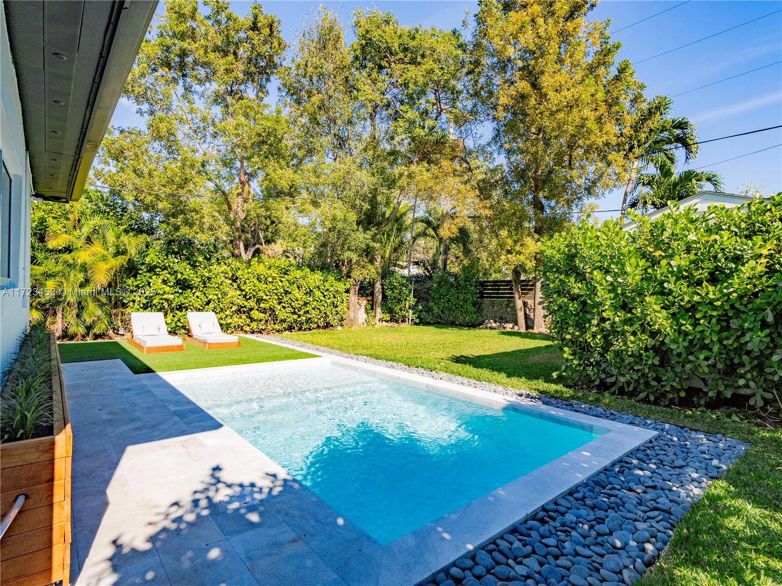 1001 Southwest 23rd Road Miami, FL 33129 - Photo 19 of 38 a view of an outdoor space and swimming pool