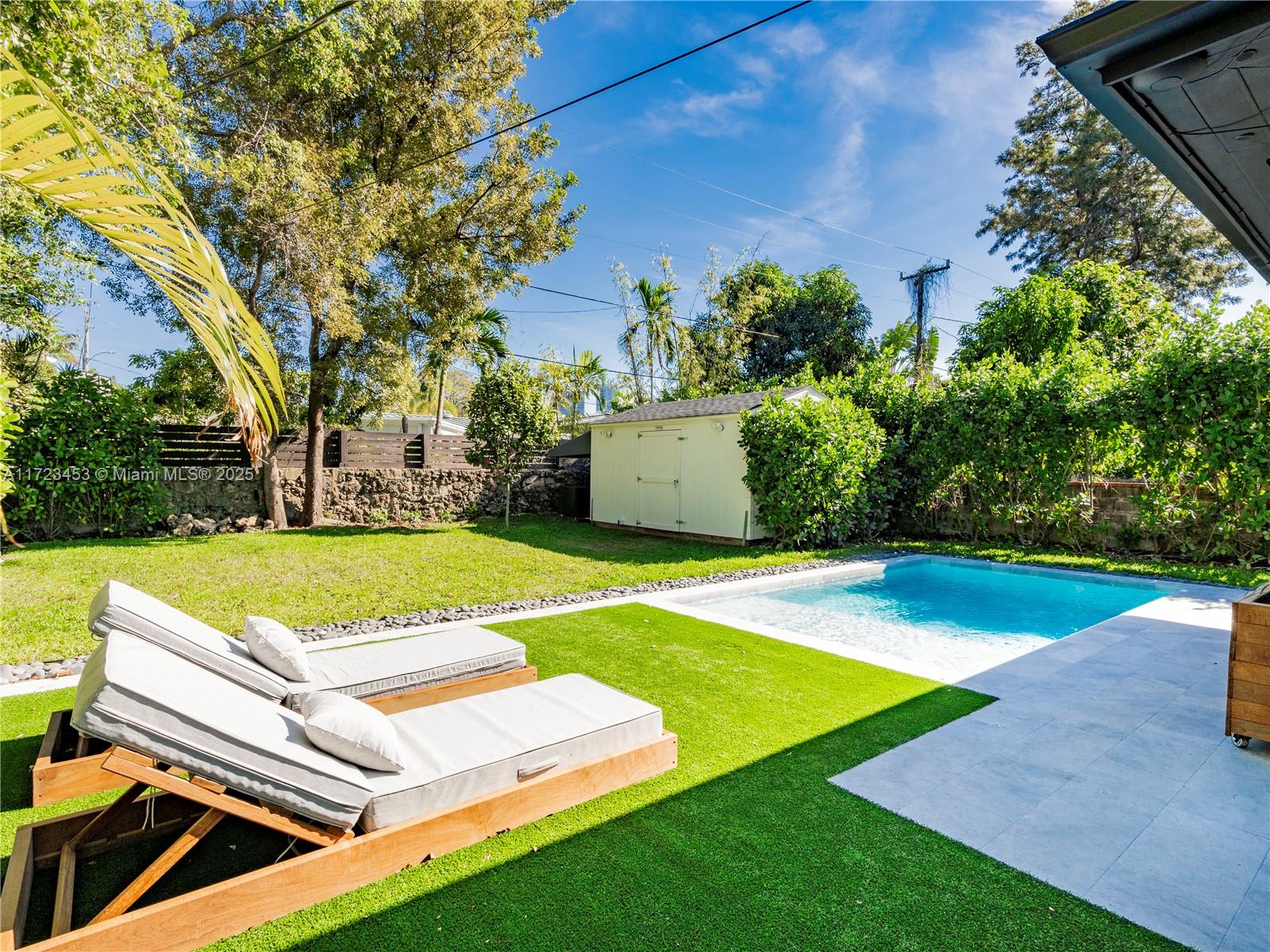 1001 Southwest 23rd Road Miami, FL 33129 - Photo 20 of 38 a view of a backyard with swimming pool