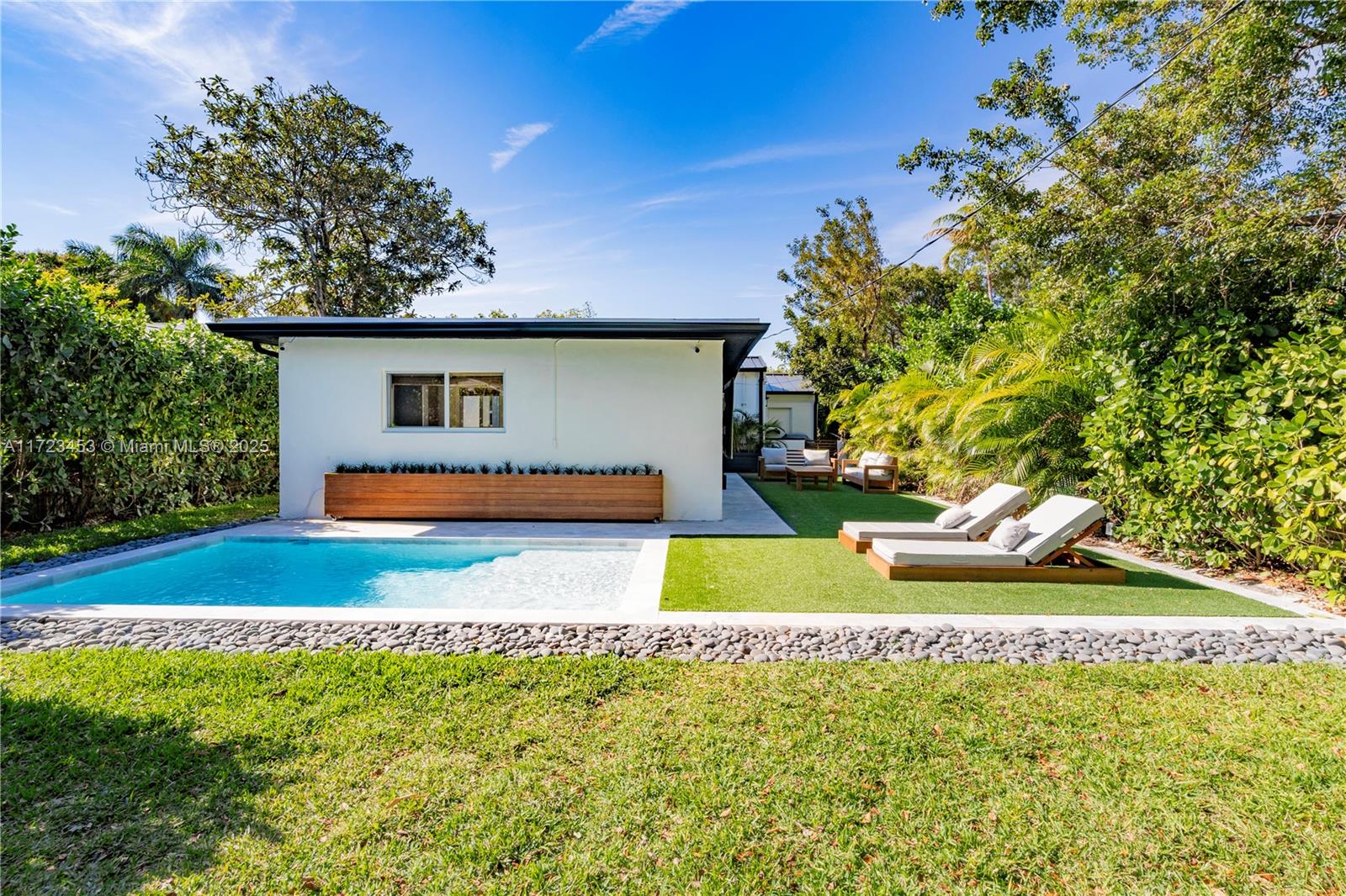 1001 Southwest 23rd Road Miami, FL 33129 - Photo 21 of 38 a view of a house with swimming pool