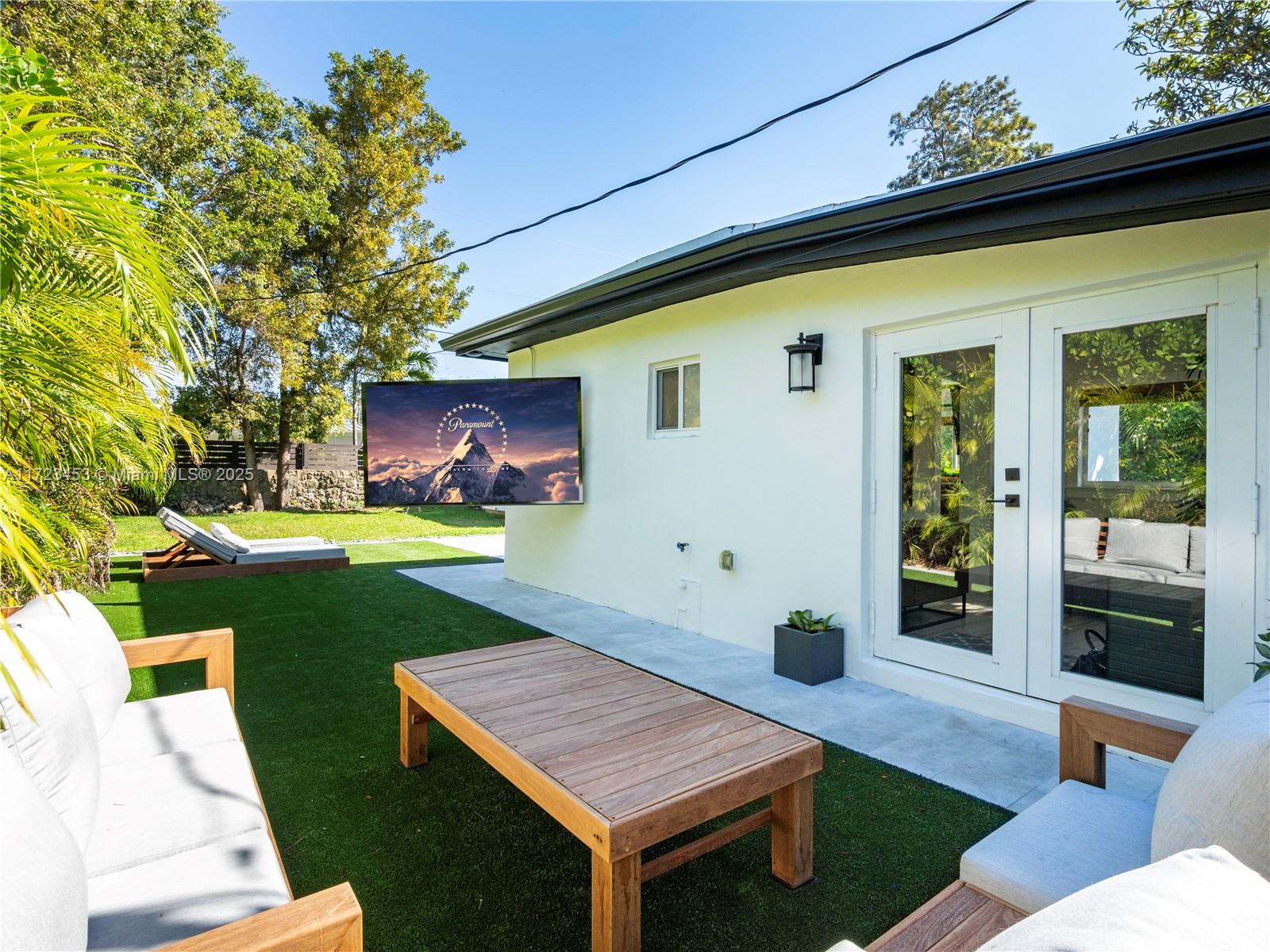 1001 Southwest 23rd Road Miami, FL 33129 - Photo 24 of 38 a view of an house with backyard space and porch