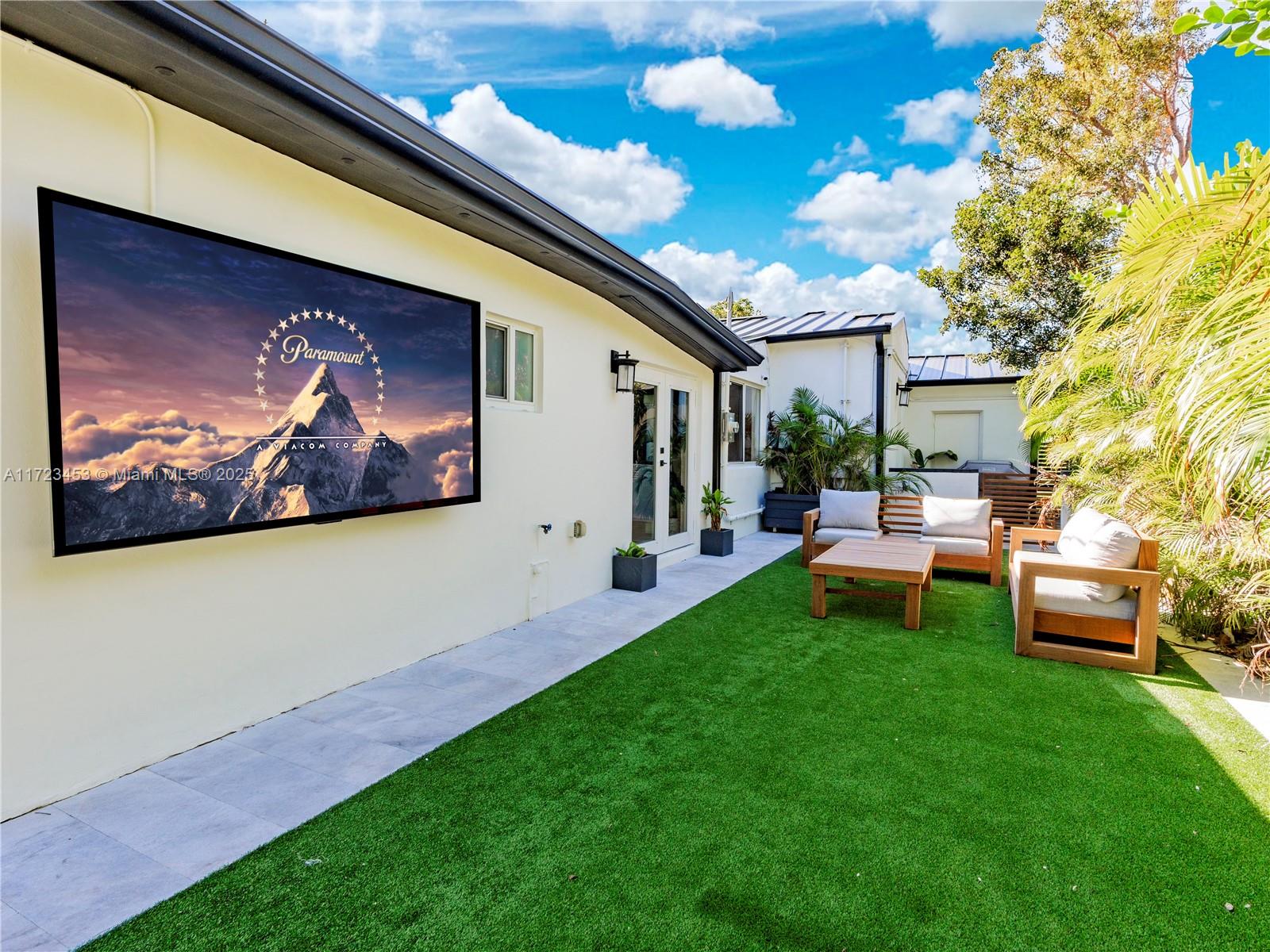 1001 Southwest 23rd Road Miami, FL 33129 - Photo 25 of 38 a view of an house with backyard space and sitting area