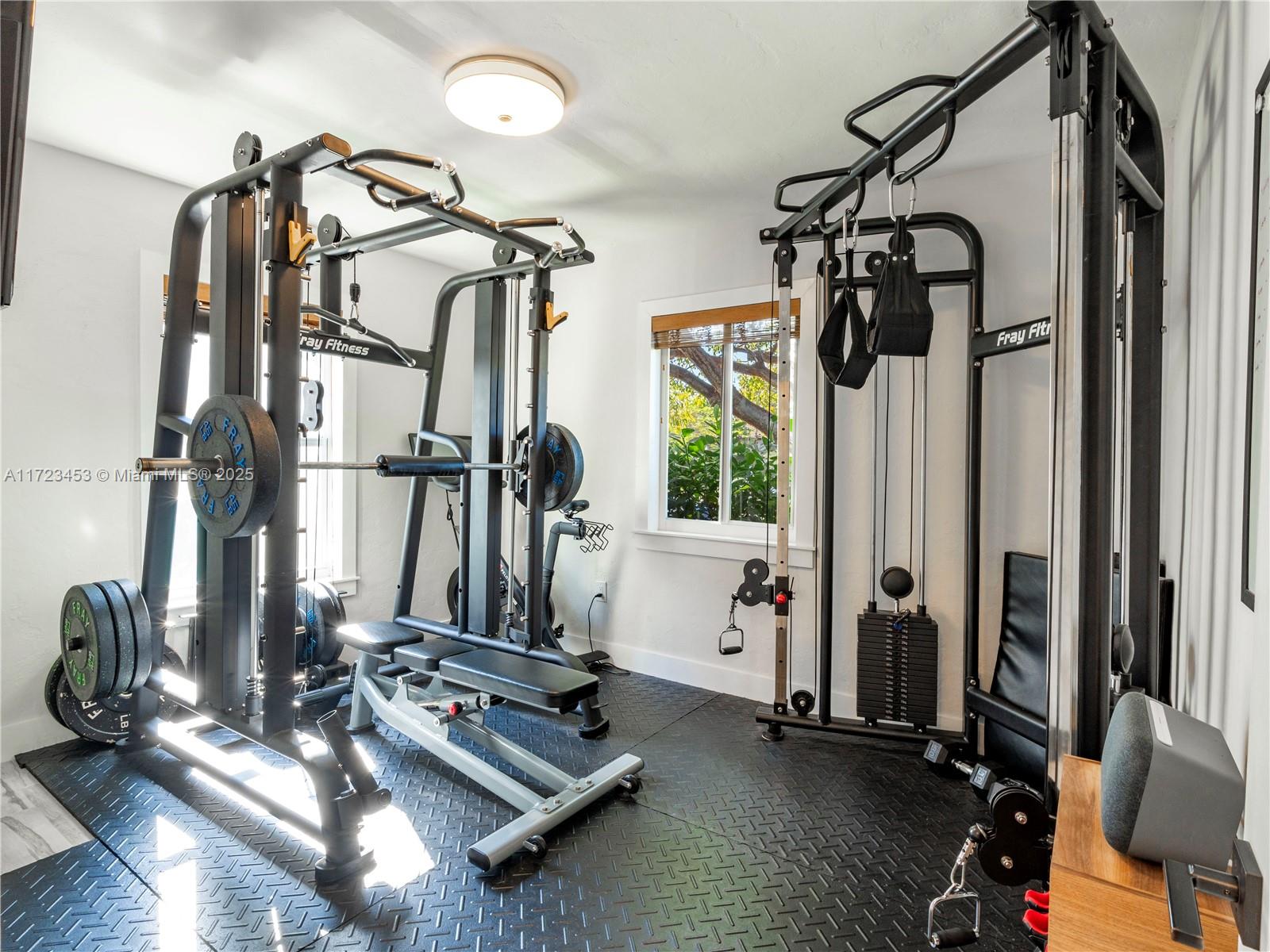 1001 Southwest 23rd Road Miami, FL 33129 - Photo 27 of 38 a view of a room with gym equipment