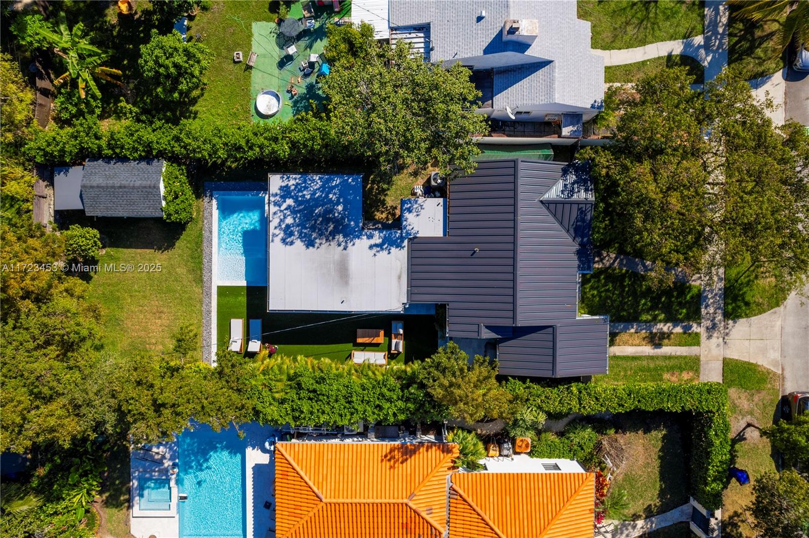 1001 Southwest 23rd Road Miami, FL 33129 - Photo 3 of 38 an aerial view of house with yard swimming pool and outdoor seating