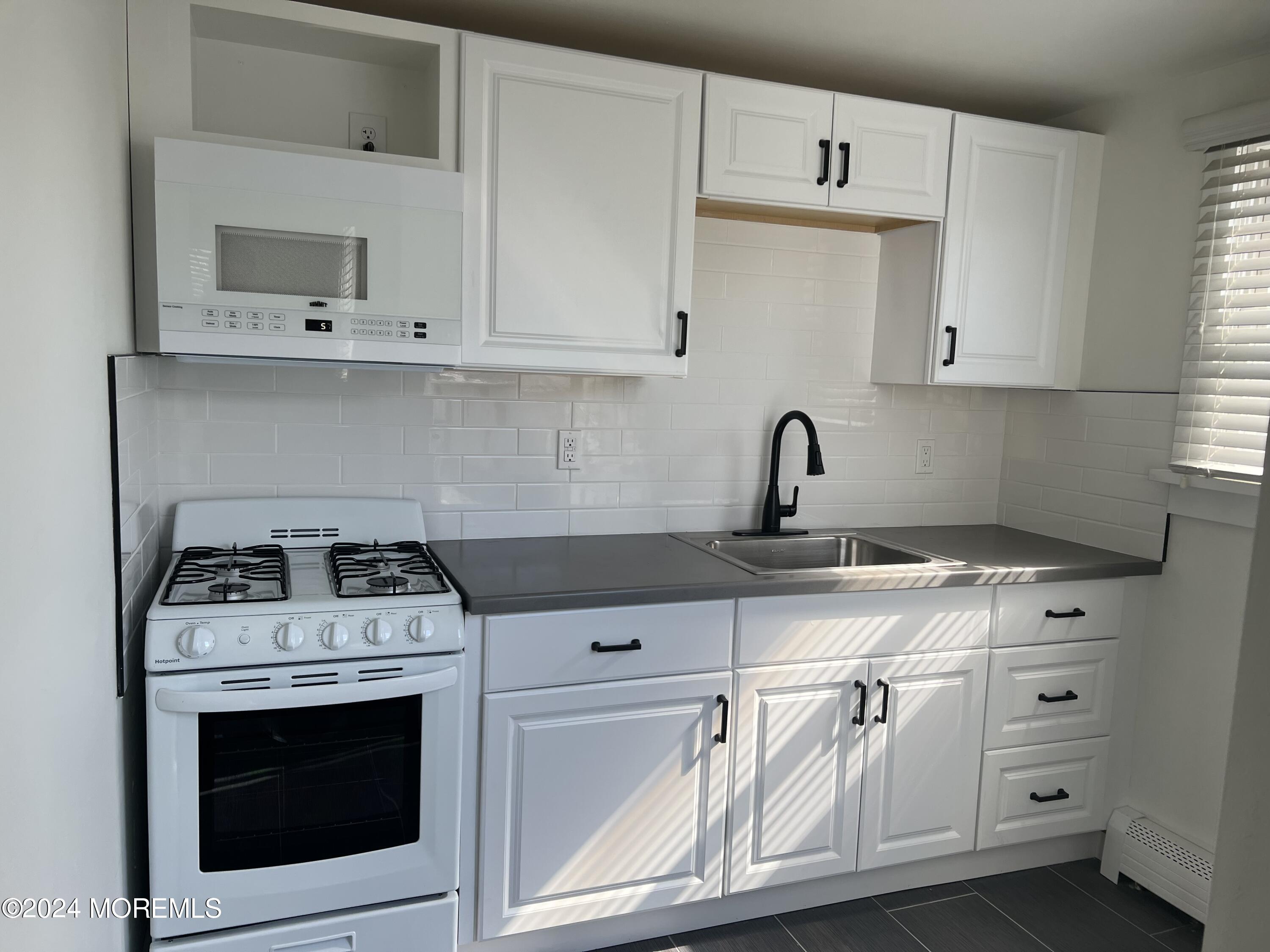 1716 Highway 71, Unit D Spring Lake Heights, NJ 07762 - Photo 2 of 7 IMG_9735