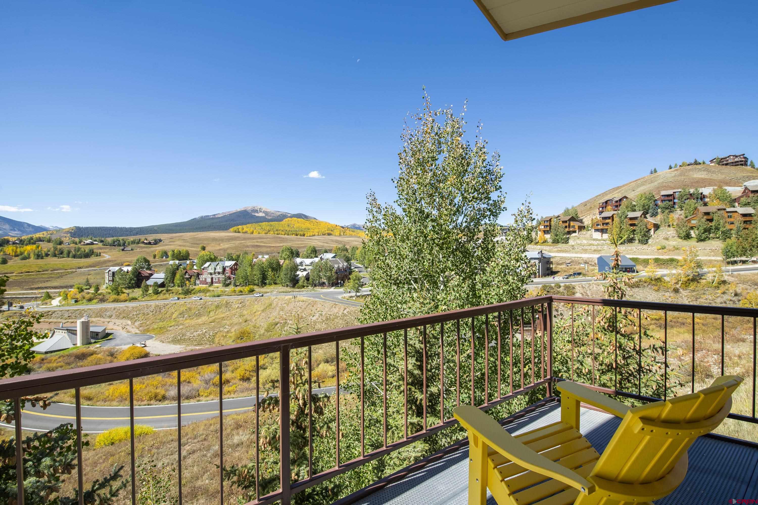 19 Castle Road, Unit 5 Crested Butte, CO 81225 - Photo 17 of 32 a view of a chairs and table on the balcony