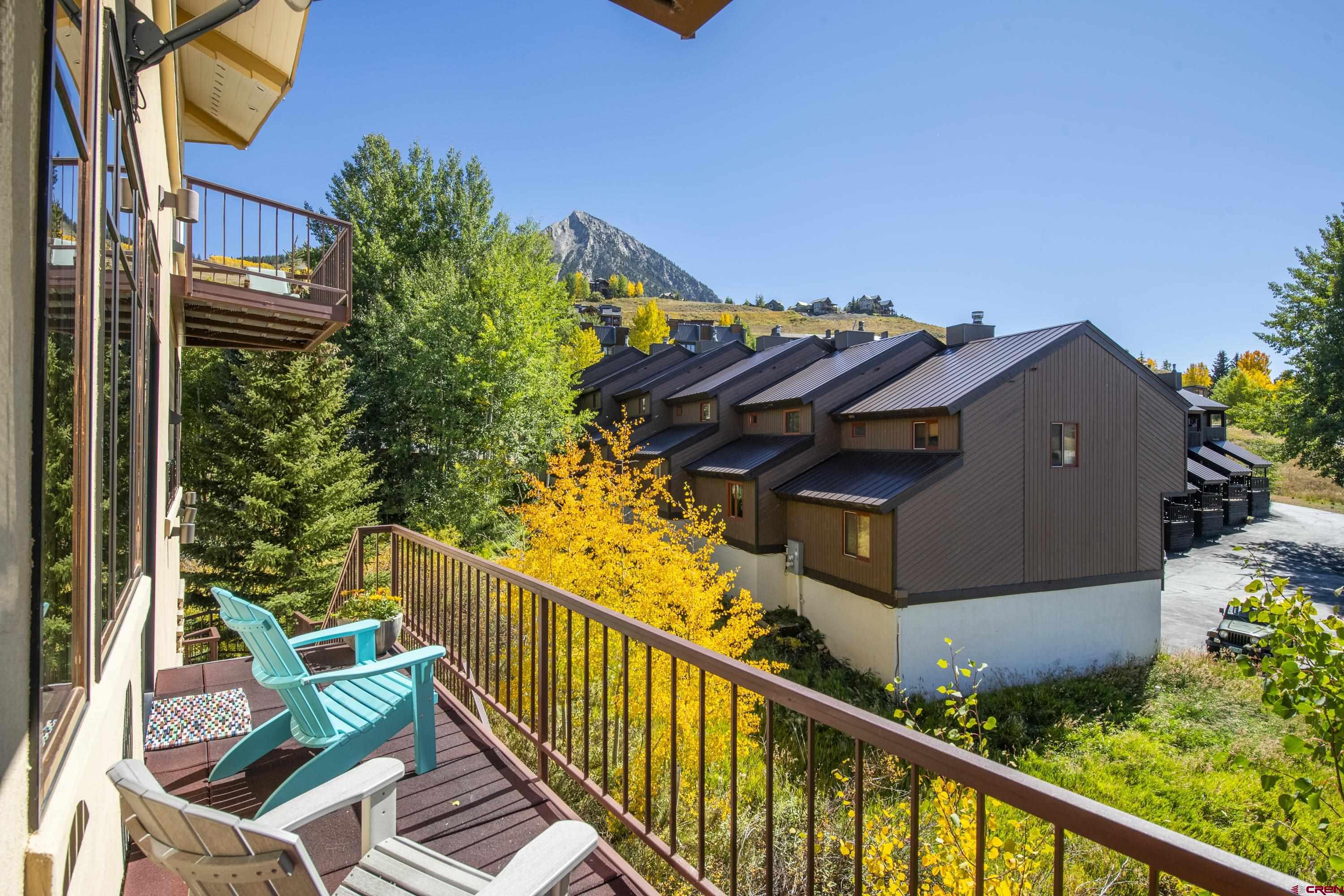 19 Castle Road, Unit 5 Crested Butte, CO 81225 - Photo 24 of 32 a view of a balcony with chairs