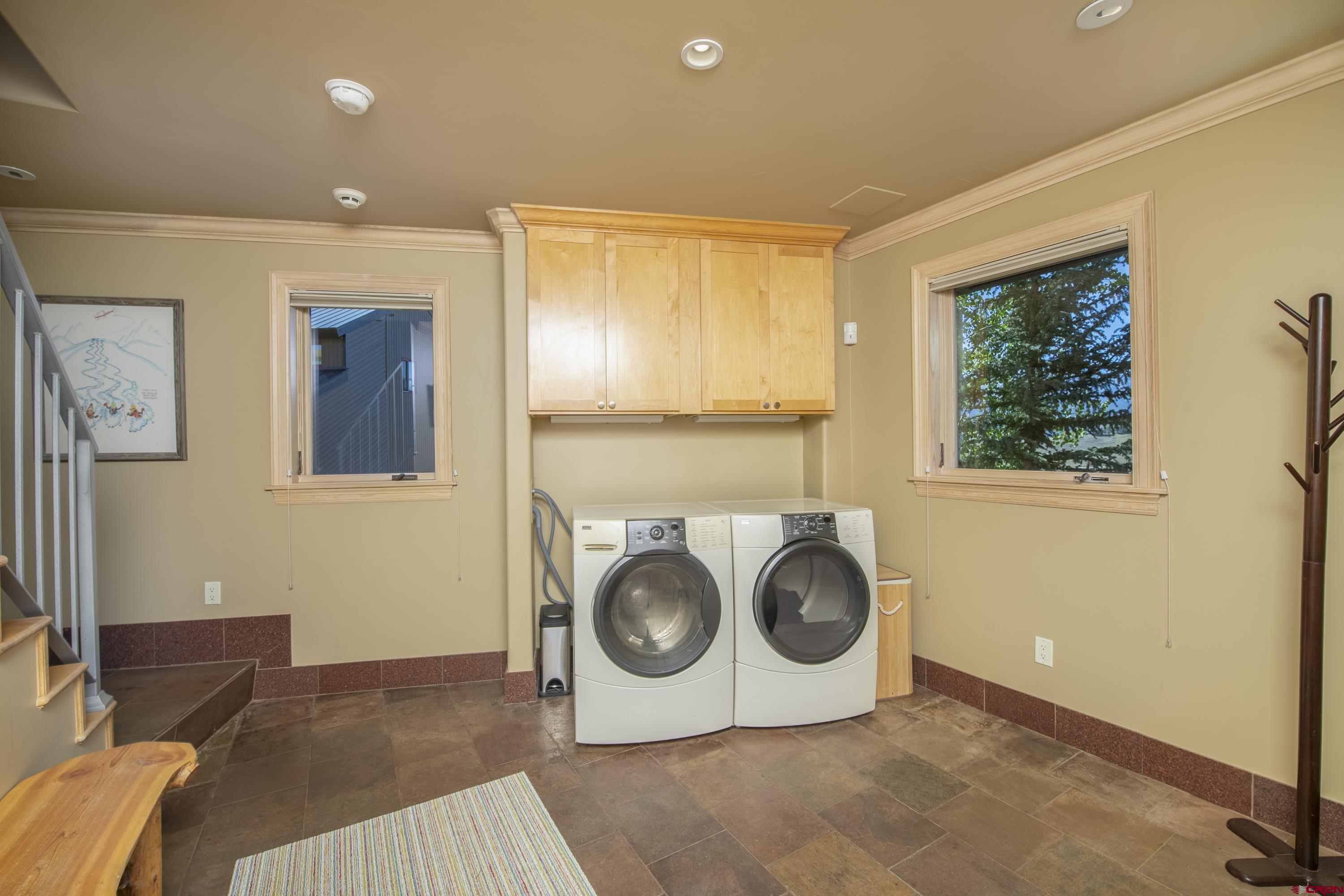 19 Castle Road, Unit 5 Crested Butte, CO 81225 - Photo 25 of 32 a utility room with window washer and dryer