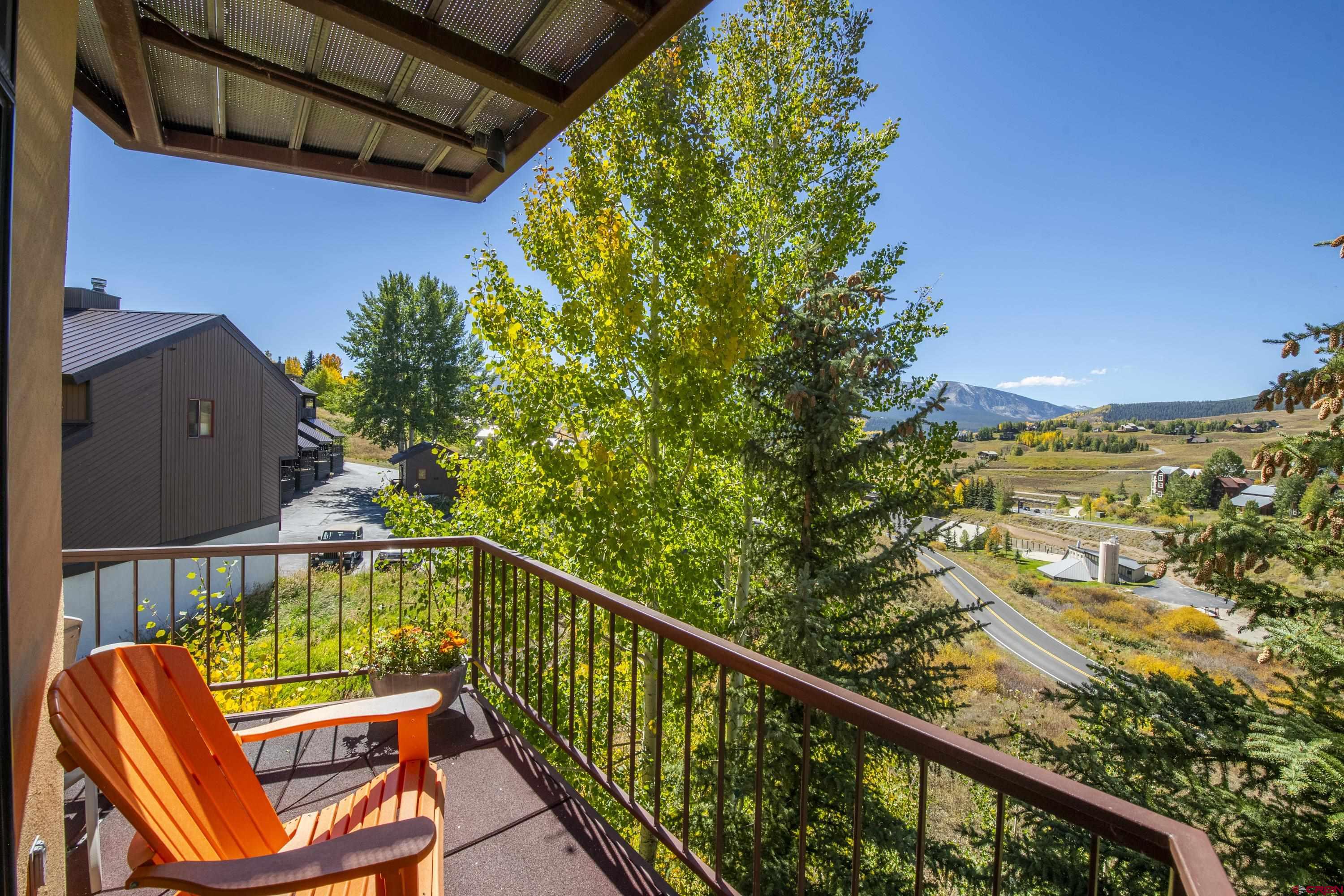 19 Castle Road, Unit 5 Crested Butte, CO 81225 - Photo 27 of 32 a view of a balcony with furniture