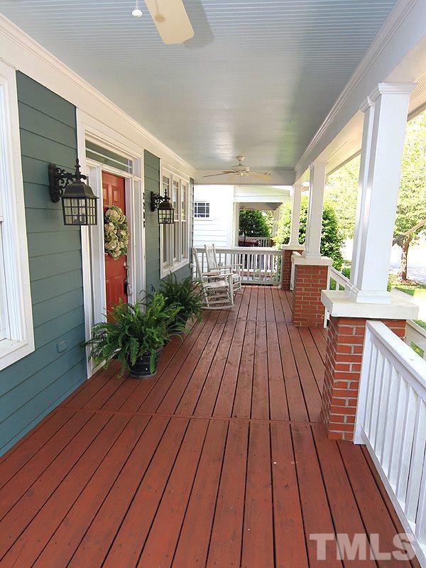 2208 Karns Place Raleigh, NC 27614 - Photo 3 of 25 a view of balcony with wooden floor and outdoor seating