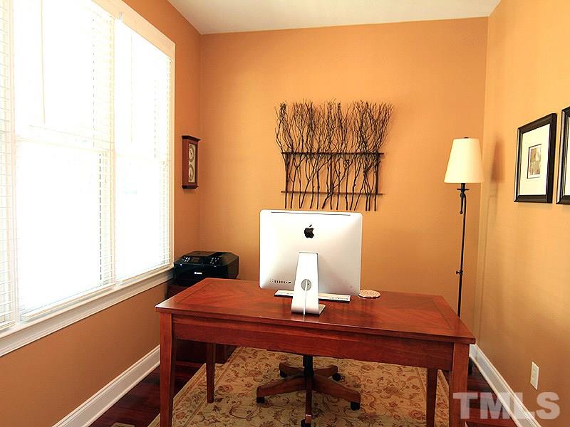 2208 Karns Place Raleigh, NC 27614 - Photo 6 of 25 a room with a table and a painting on the wall