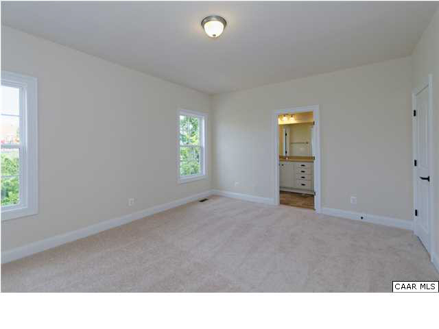 2076 Avinity Loop Charlottesville, VA 22902 - Photo 13 of 26 a room with a window and a chair