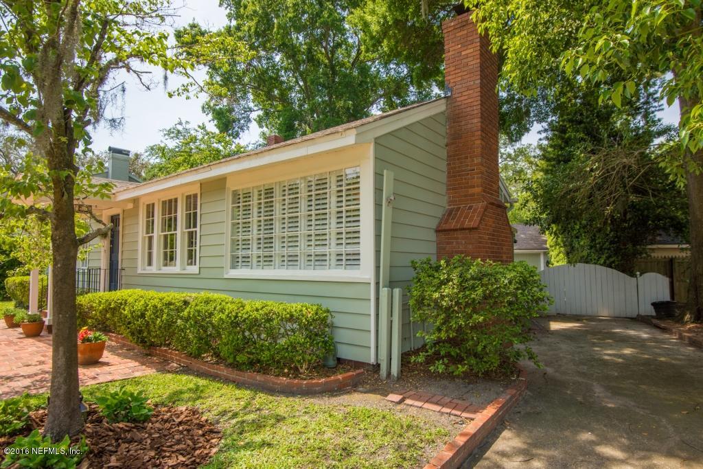 1128 Greenridge Road Jacksonville, FL 32207 - Photo 12 of 37 a front view of a house with a yard