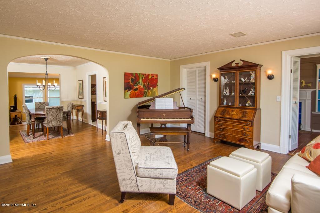 1128 Greenridge Road Jacksonville, FL 32207 - Photo 14 of 37 a living room with furniture and wooden floor