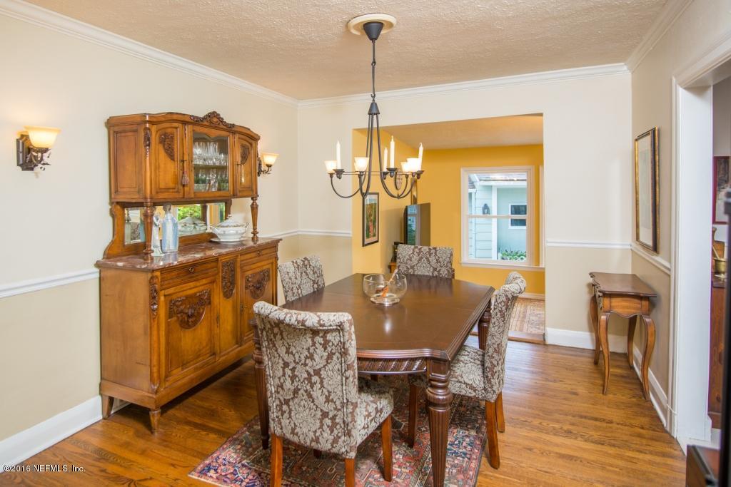 1128 Greenridge Road Jacksonville, FL 32207 - Photo 5 of 37 a view of a dining room with furniture window and wooden floor