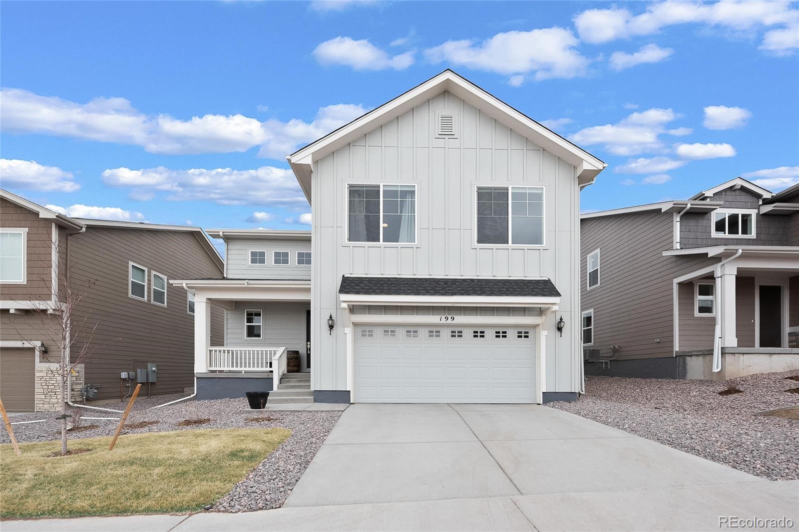 199 Simmental Loop Castle Rock, CO 80104 - Photo 2 of 40 a view of a house with a yard