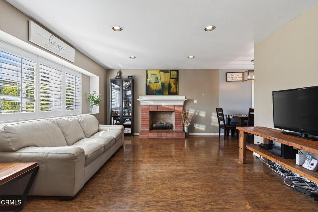729 Ralph Way Santa Paula, CA 93060 - Photo 11 of 55 a living room with furniture and a flat screen tv
