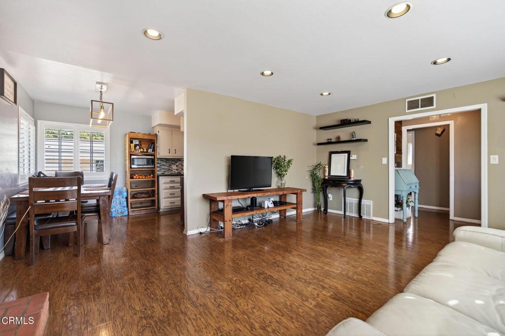 729 Ralph Way Santa Paula, CA 93060 - Photo 12 of 55 a living room with furniture and a flat screen tv