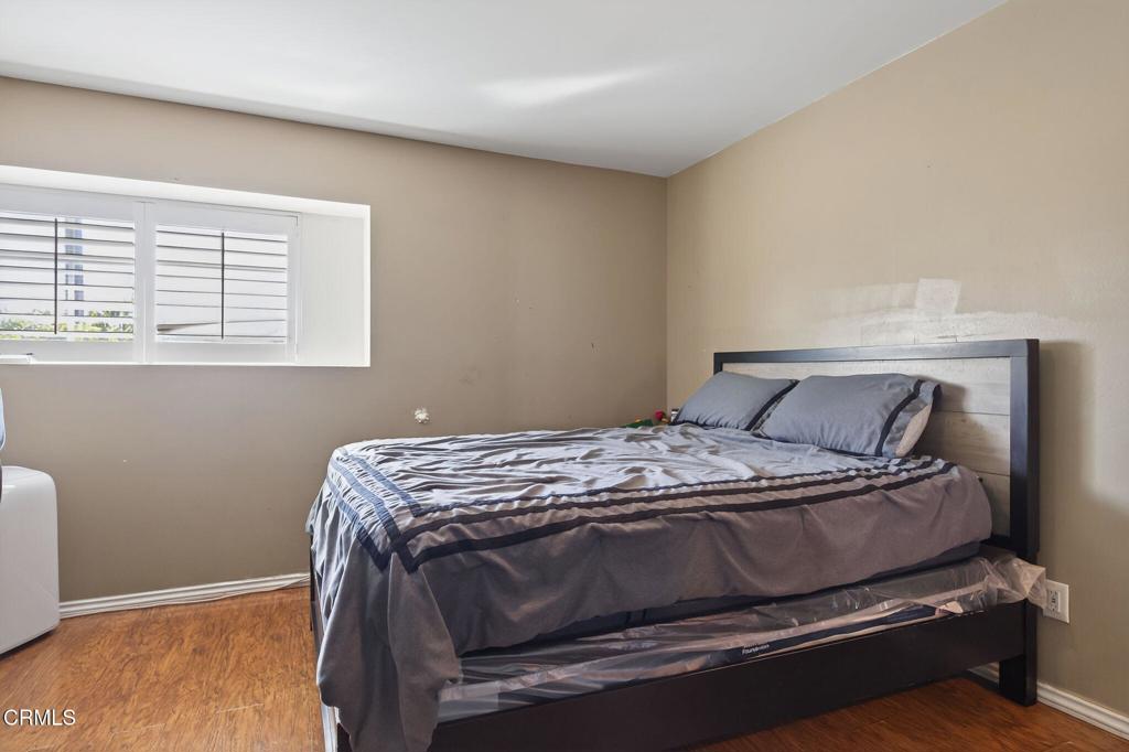 729 Ralph Way Santa Paula, CA 93060 - Photo 21 of 55 a bed sitting in a bedroom next to a window